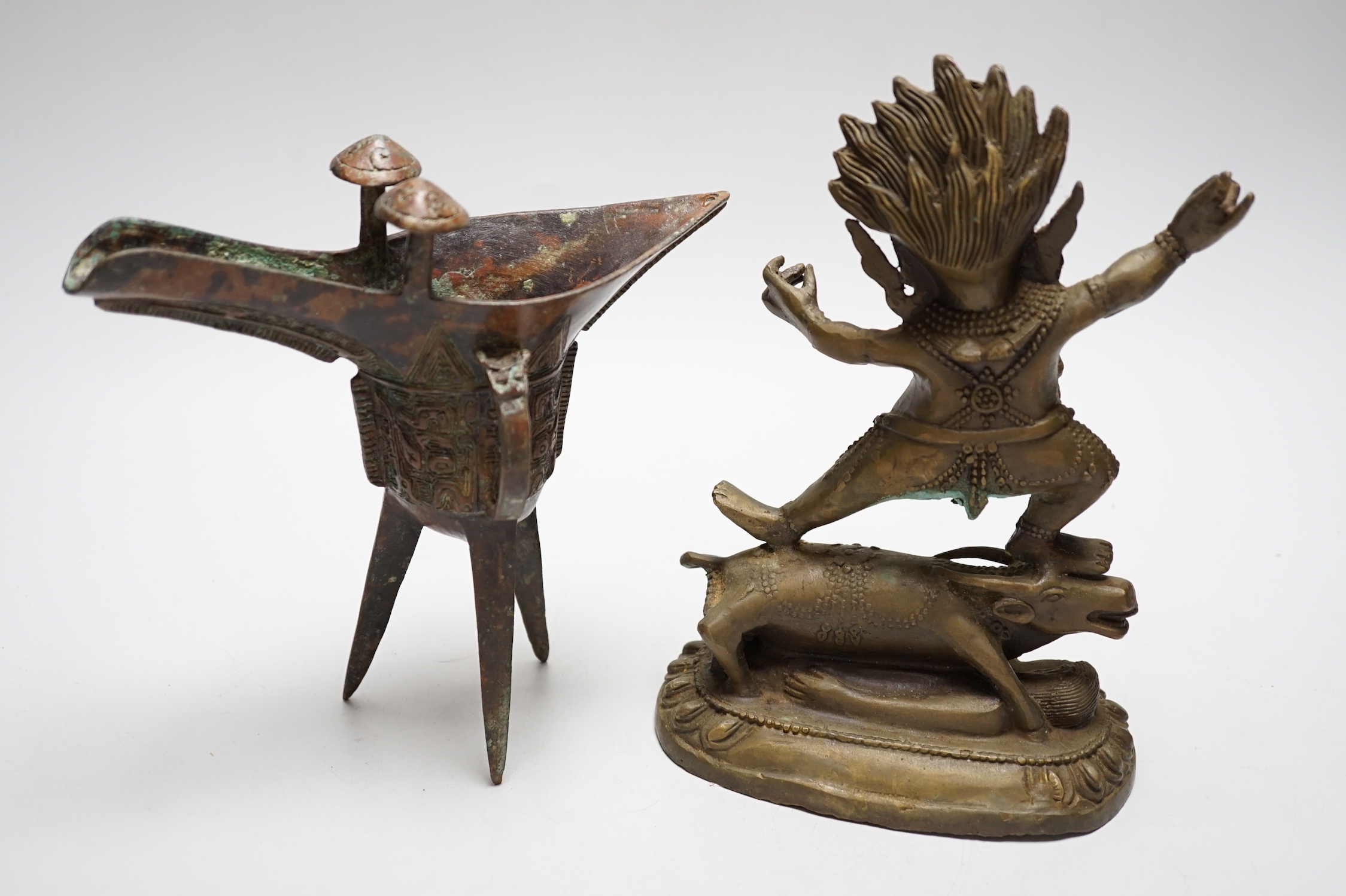 A Buddhist bronze figure and a bronze yi vessel, figure 22cm high